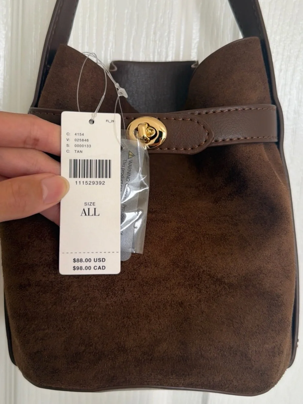 Anthropologie Brown faux suede bucket bag with leather strap and leather pouch